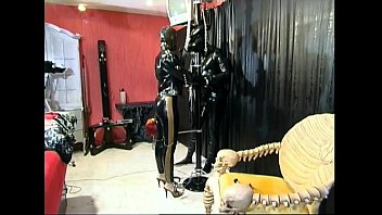 Master And Slave Chick In A BDSM Scene Master And Slave Chick In A BDSM Scene