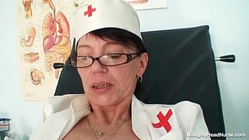 Aged Amateur Mom Wears Glasses And Latex Uniform